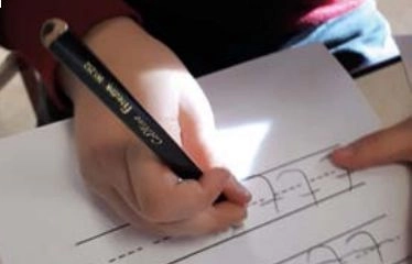 De mijlpaal van leren schrijven